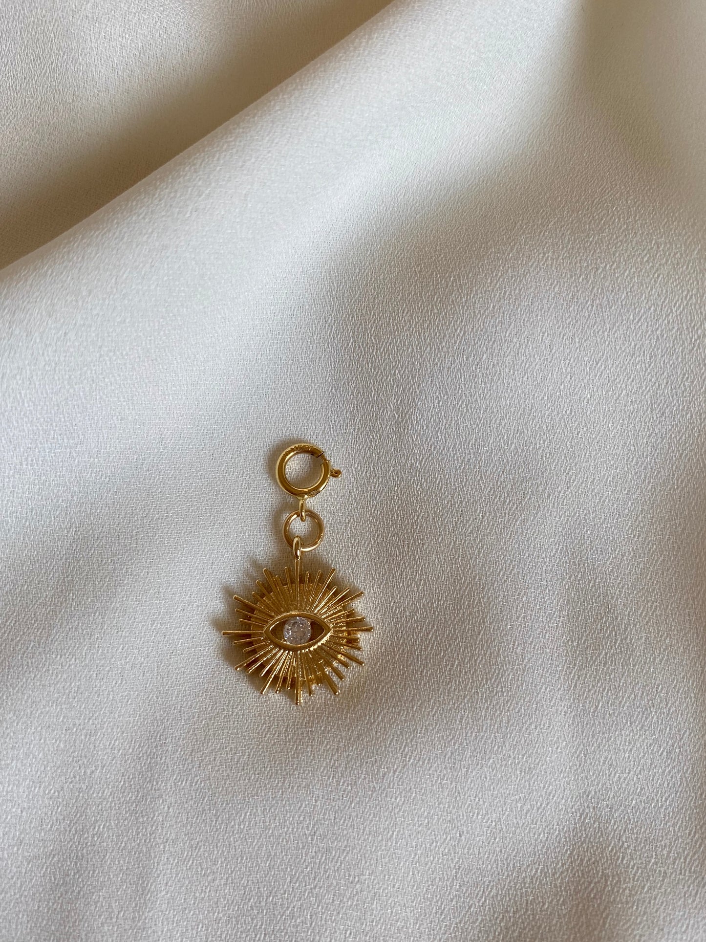 SOL MAL DE OJO charm gold