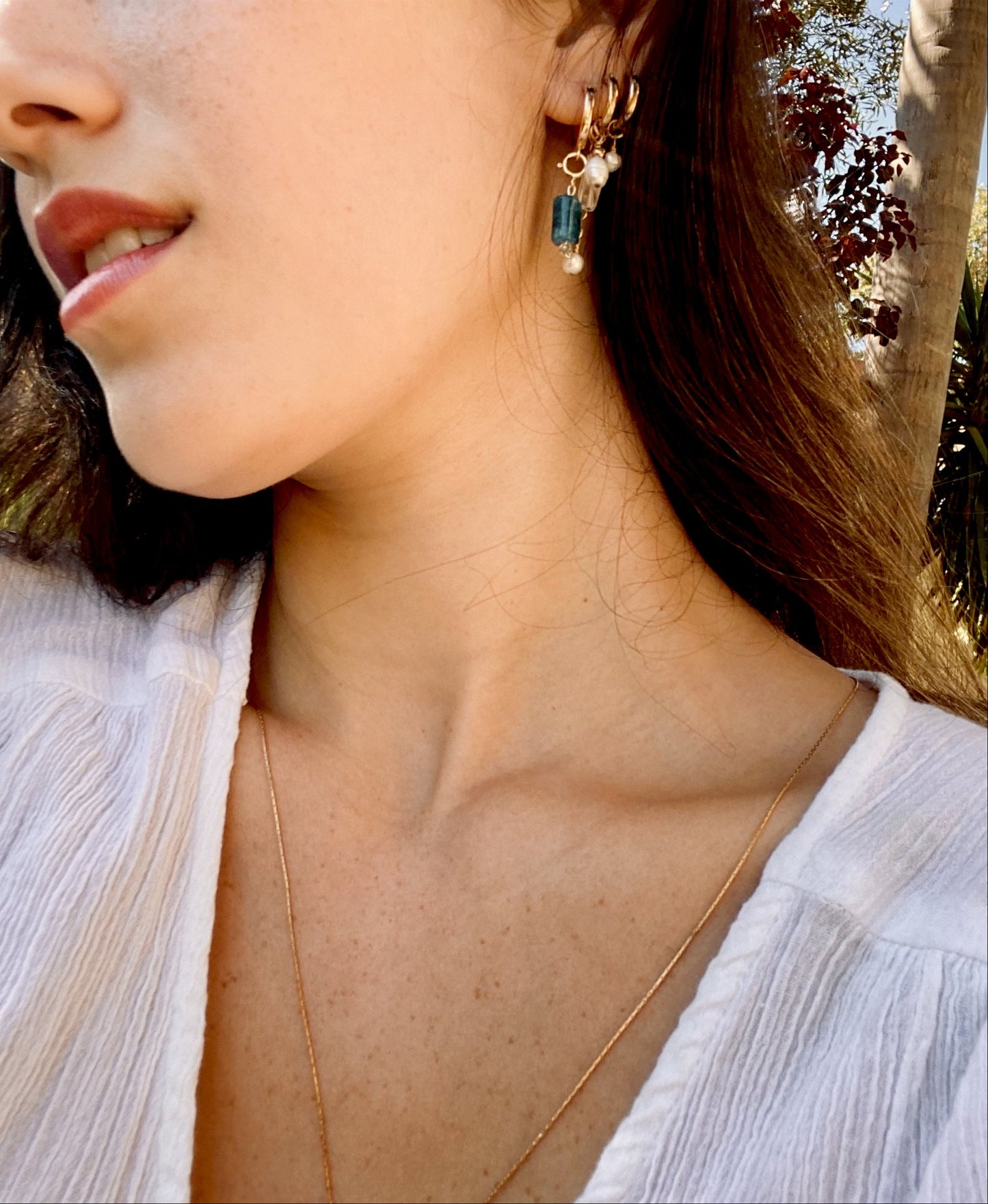 REINA HITANA PAIR earrings gold