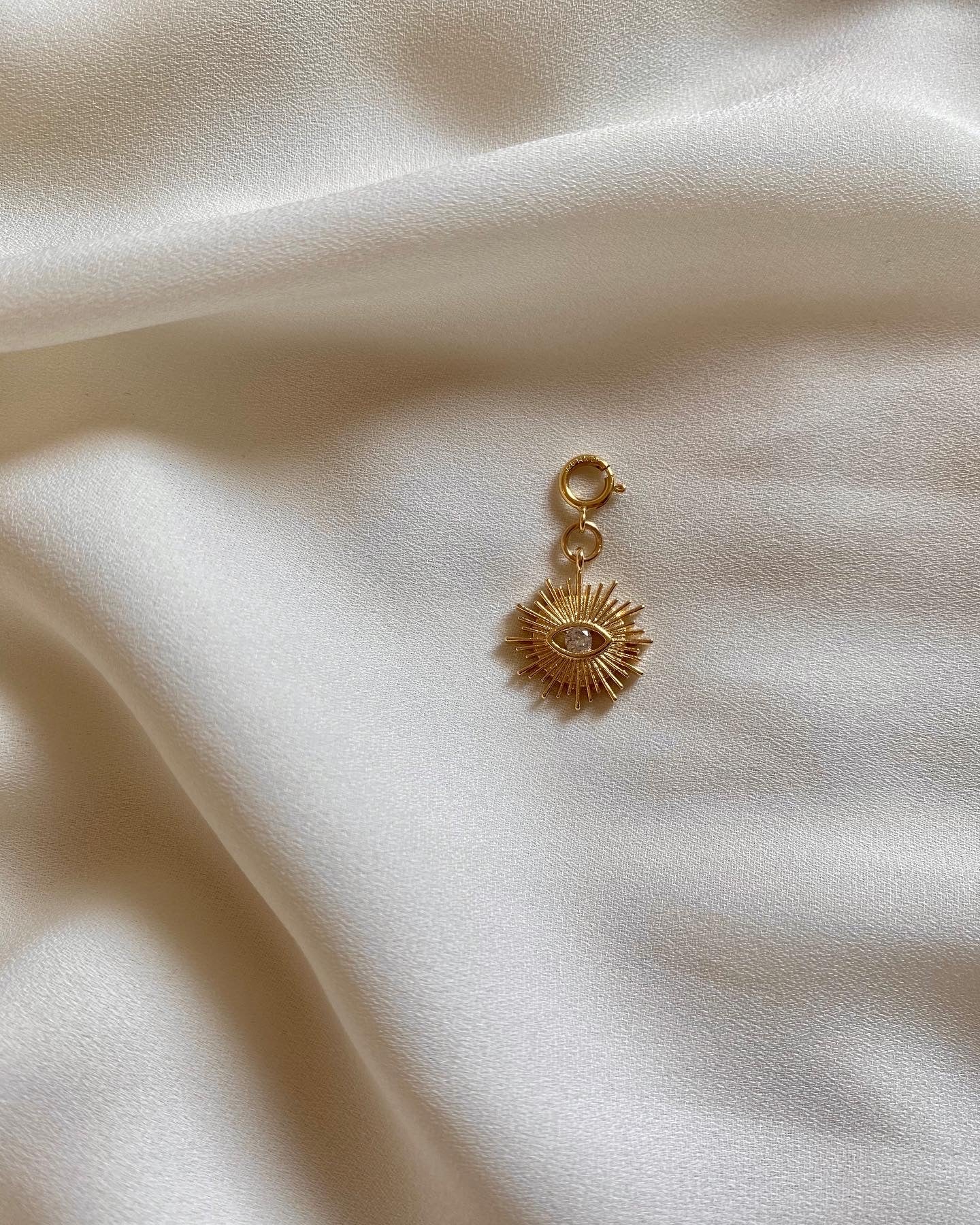 SOL MAL DE OJO charm gold